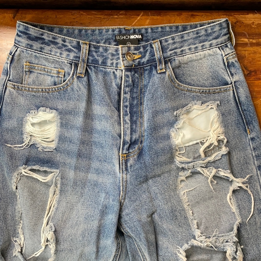 Gently worn high waisted FashionNova boyfriend ripped jeans